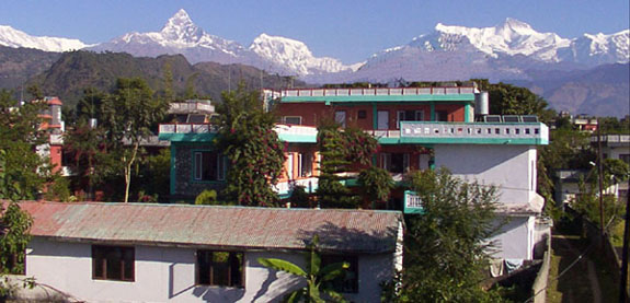 The lodge lies on the shores of Pokhara's largest Lake. Sufficiently set back from the main road to guarantee peace, quiet & privacy, there are just 16 rooms all with attach tiled toilets and 24 hours hot and cold running water. The Lodge is built around one of the best gardens in Lakeside Pokhara, Nepal.